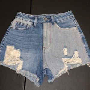 Women’s Cut-off distressed denim shorts